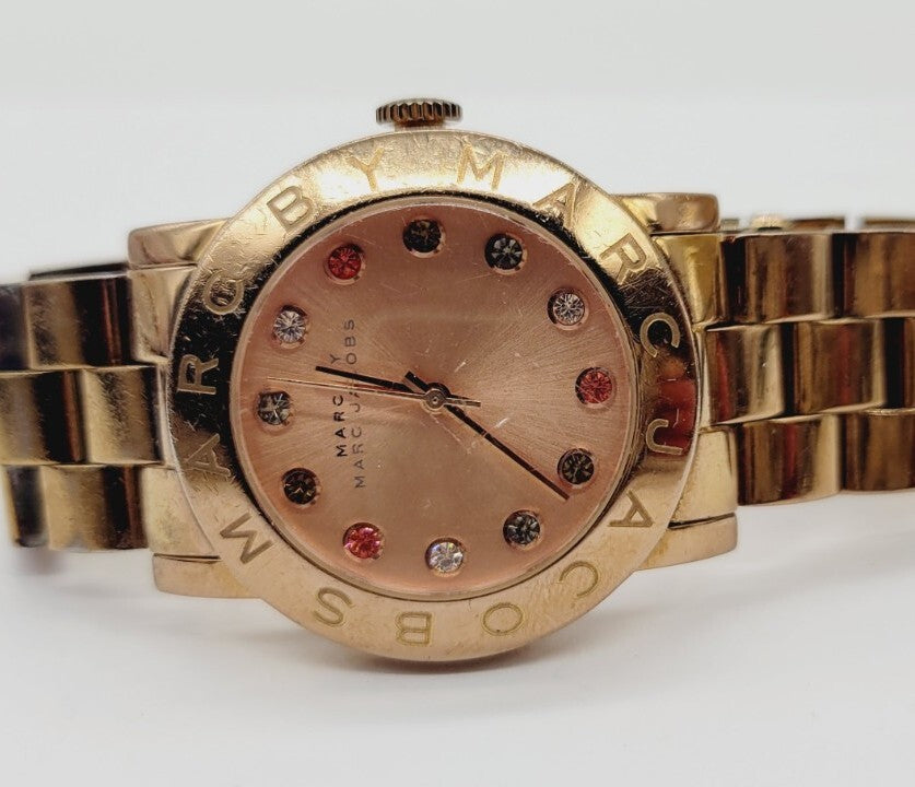 Side angle of Marc by Marc Jacobs Blade watch with crystal markers on dial