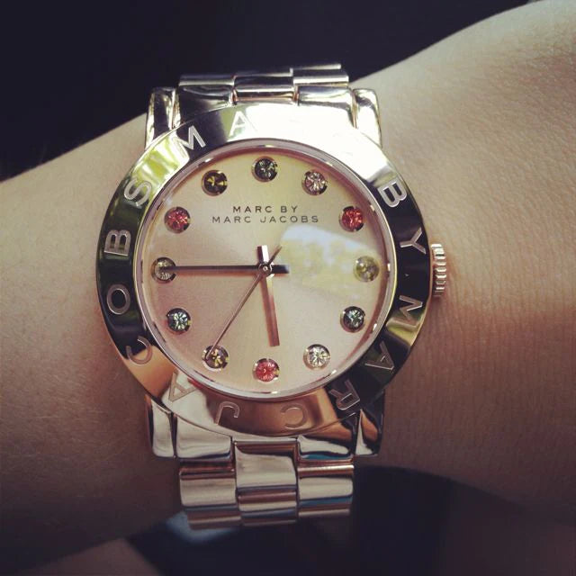 Marc by Marc Jacobs Blade watch worn on wrist showing rose gold dial and bracelet