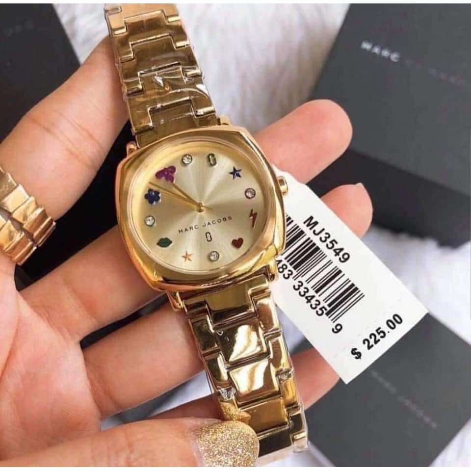 Marc Jacobs Mandy MJ3549 gold steel watch worn on wrist with price tag visible
