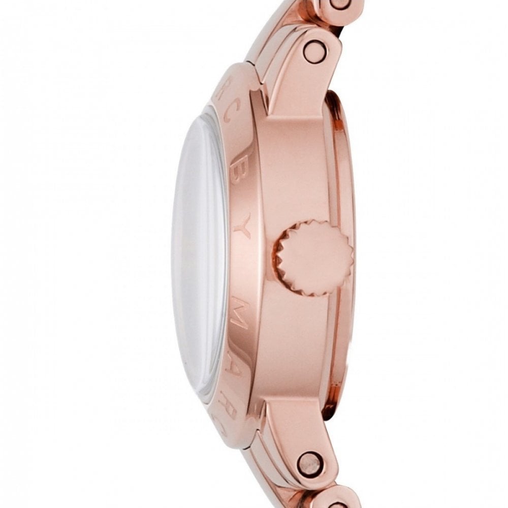 Detailed side view of Amy Dinky rose gold watch case and strap