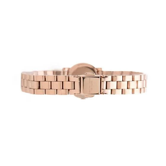 Amy Dinky rose gold watch with white dial, top view showing crystal markers