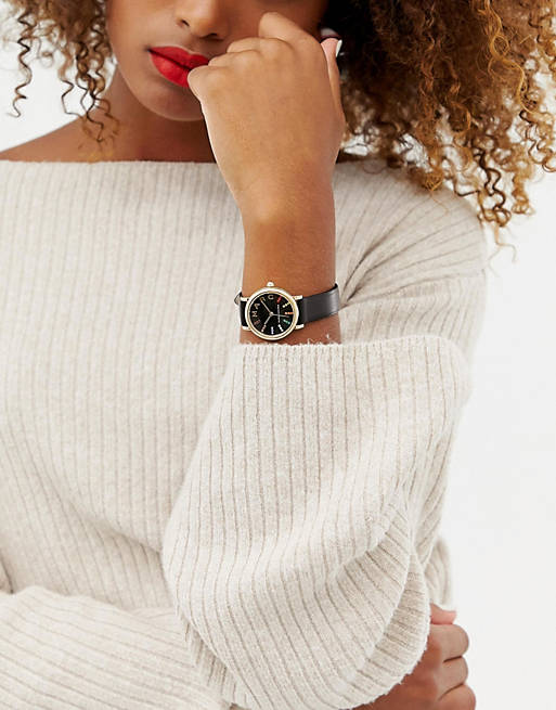 Marc Jacobs Roxy womens watch worn on wrist with black leather strap