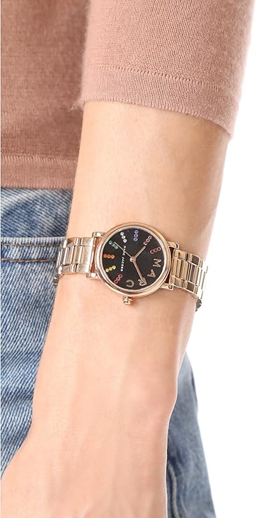 Marc Jacobs Roxy watch on wrist showing rose gold bracelet and black dial detail