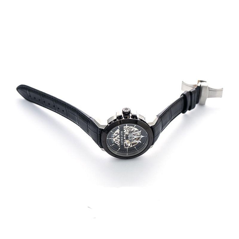 Maserati automatic watch displayed flat from above showing skeleton dial and black strap