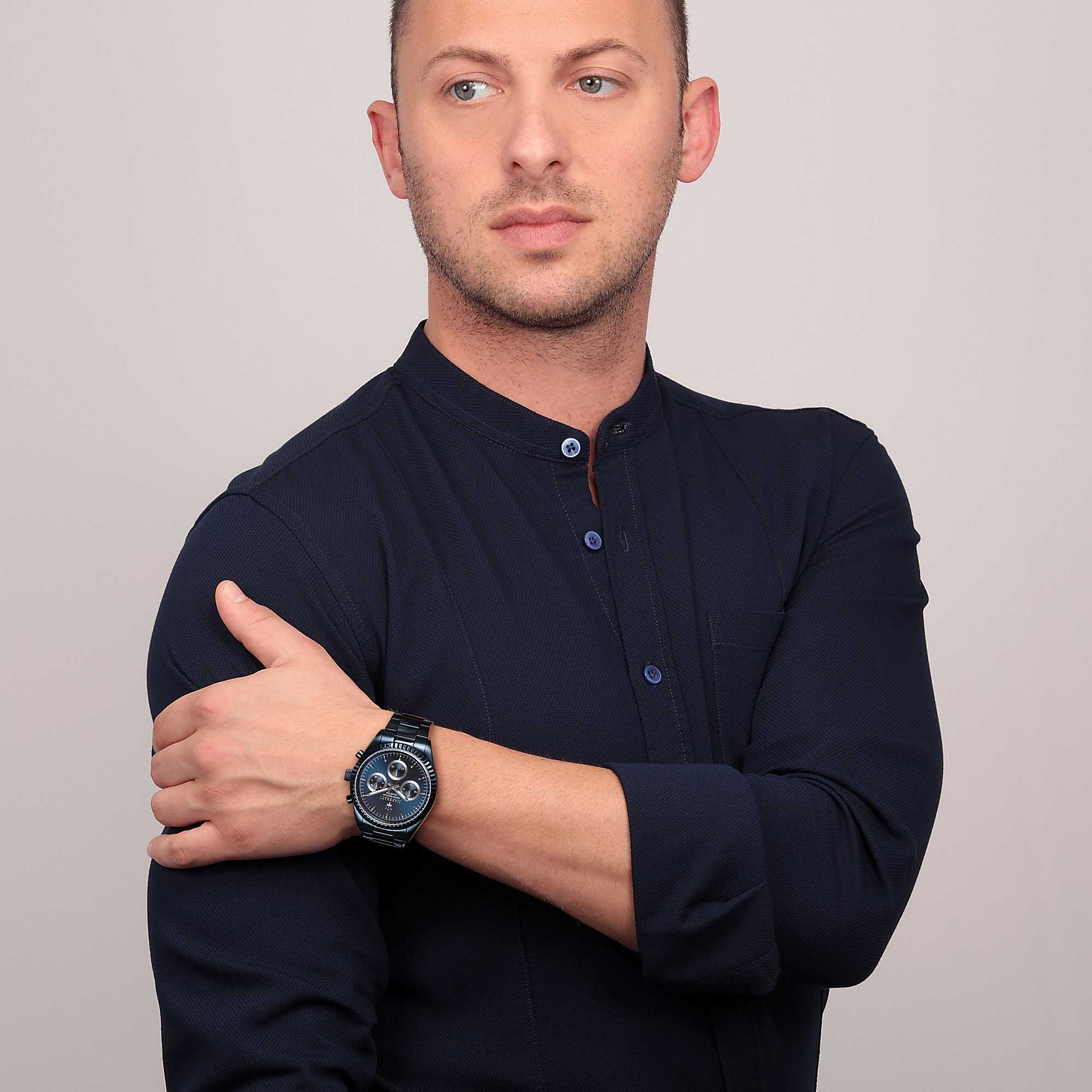 Maserati Blue Edition watch worn on wrist by man in dark shirt