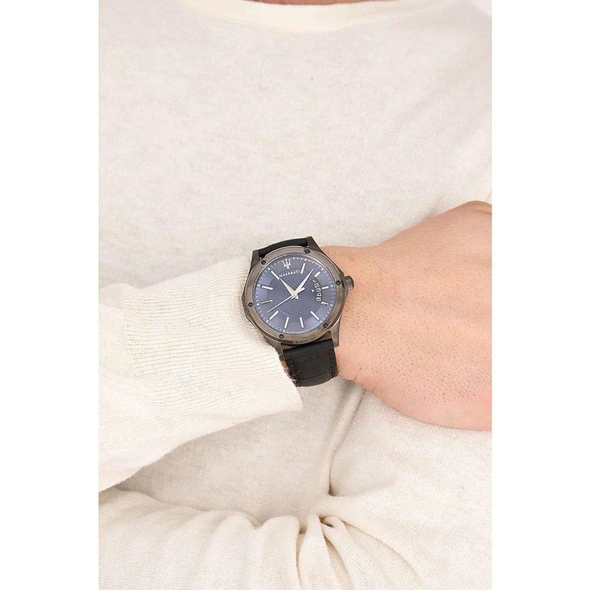 Maserati Circuito blue dial men's watch worn on wrist with black leather strap