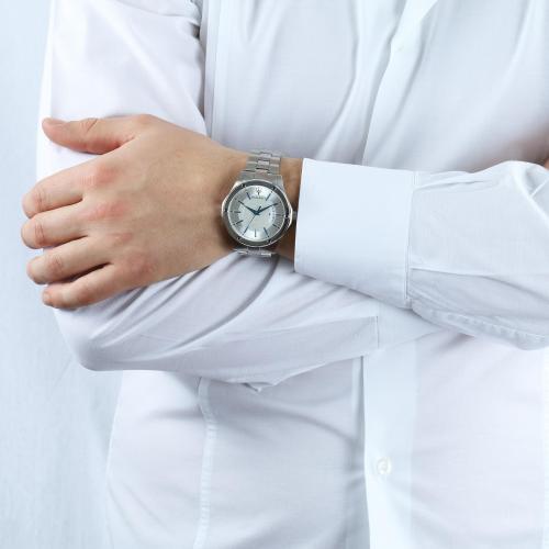 Maserati Circuito watch worn on wrist with silver dial and metal bracelet
