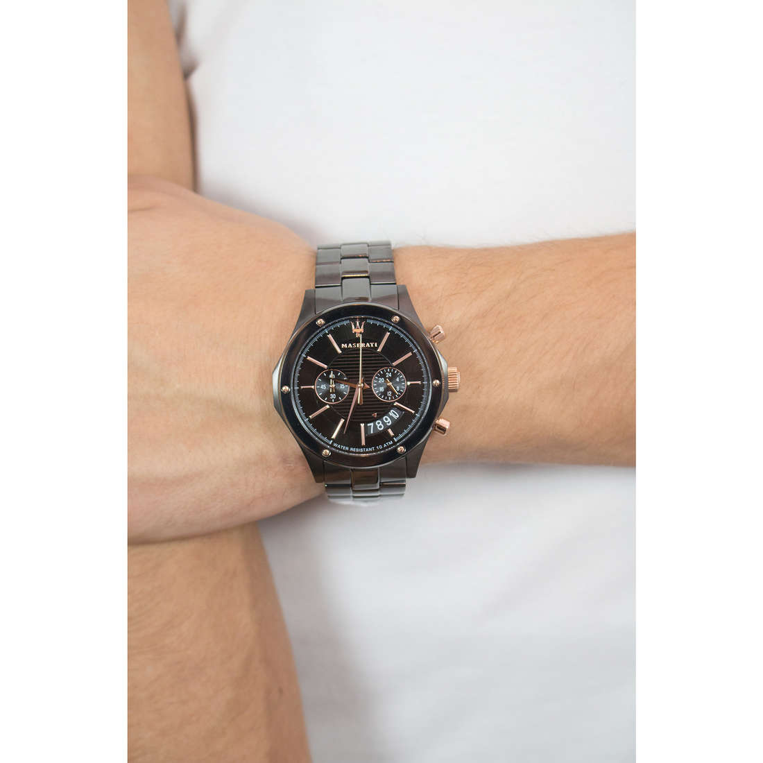 Maserati Circuito chronograph watch worn on wrist with black dial and steel bracelet
