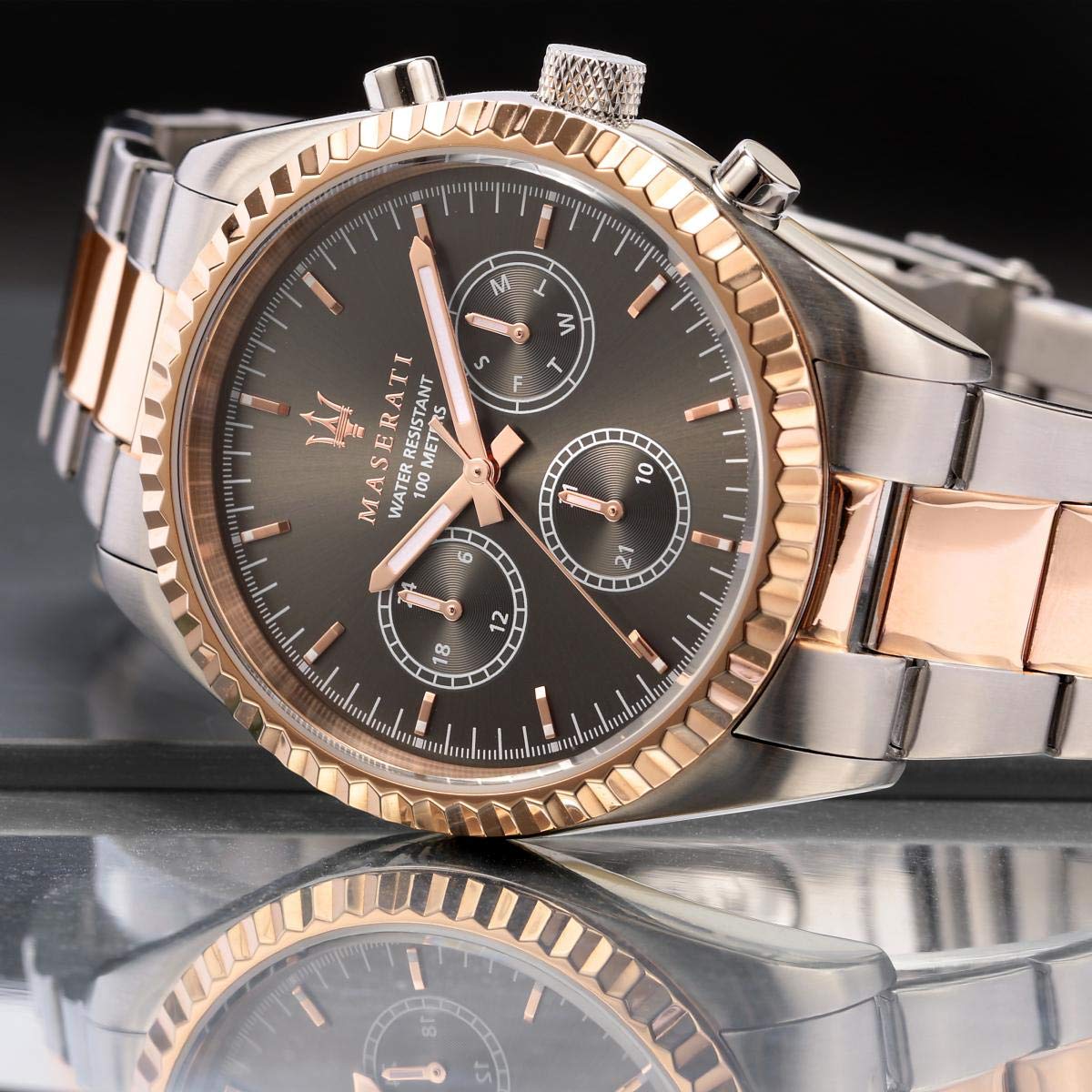 Close-up of Maserati Competizione chronograph dial with subdials and rose gold accents