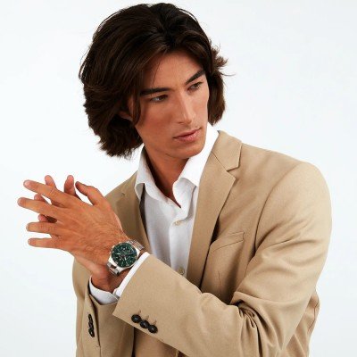 Maserati Competizione chronograph watch worn on wrist with black dial and green bezel visible