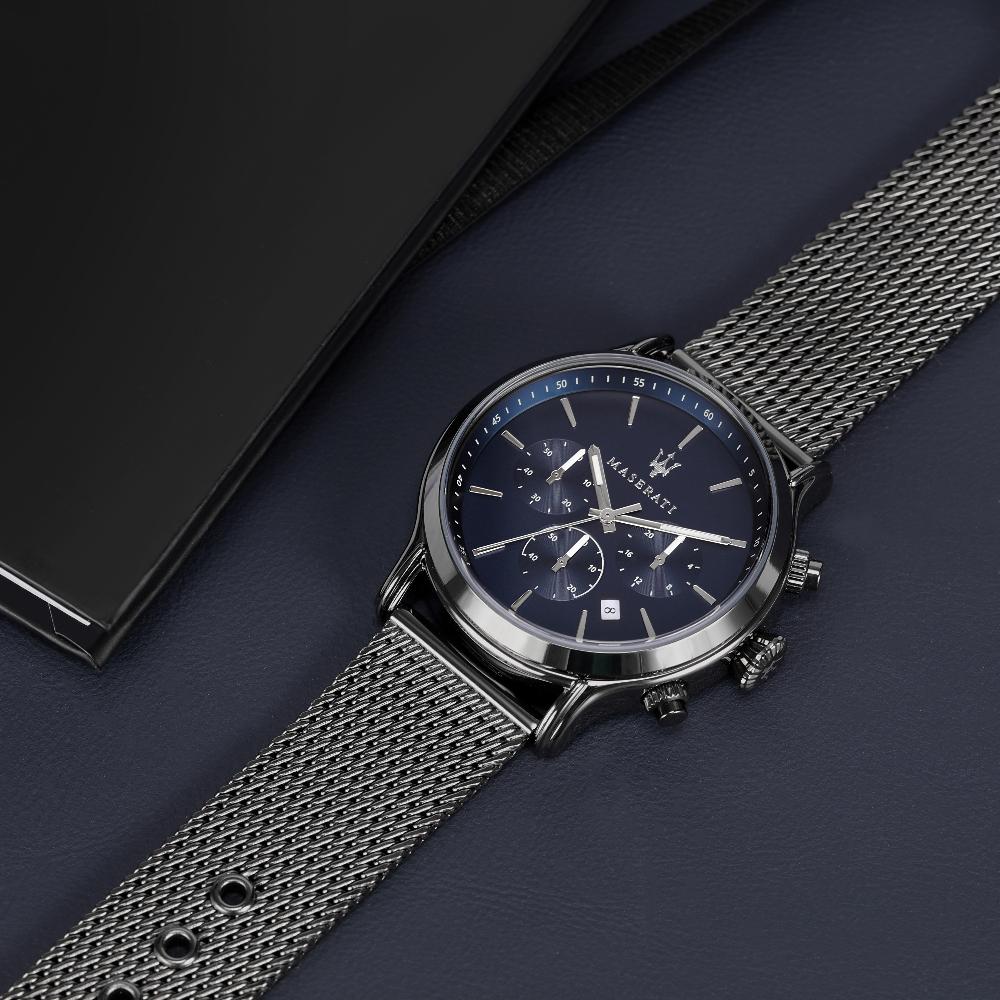 Maserati Epoca watch at angle showing mesh strap and blue dial with chronograph subdials