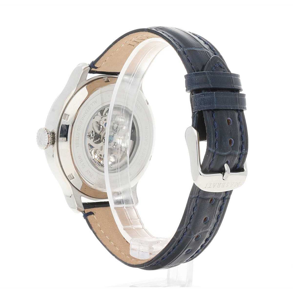 Maserati Epoca skeleton watch on wrist showing navy leather strap and tan inner lining