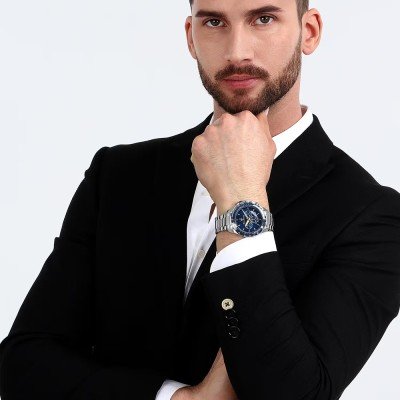 Maserati Modena chronograph watch worn on wrist with blue dial and silver bracelet