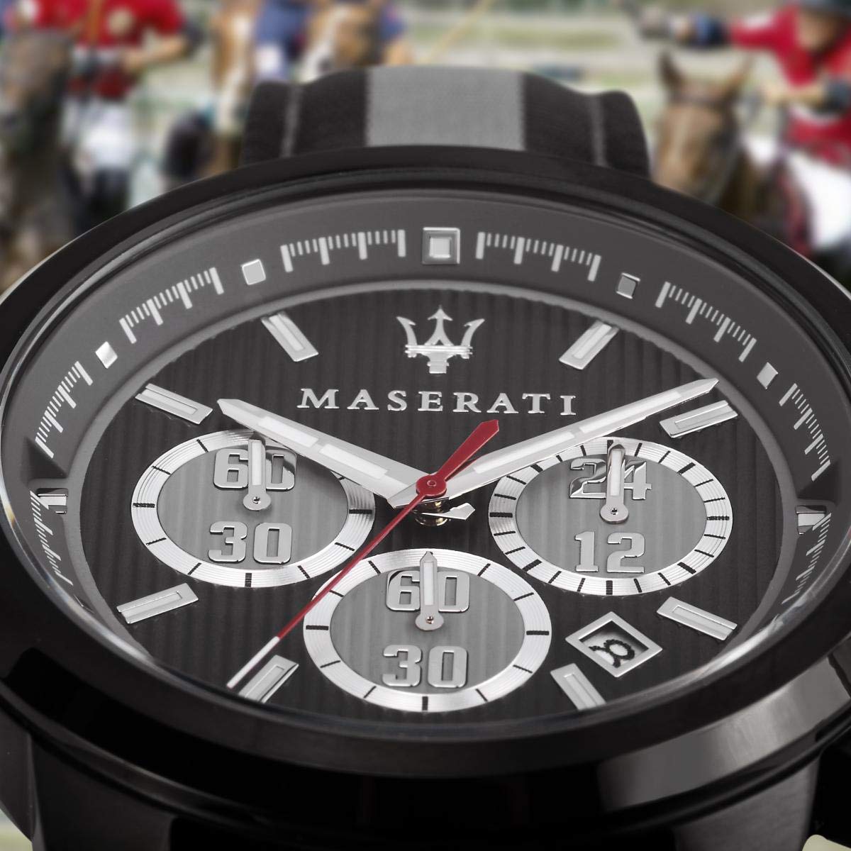 Maserati chronograph dial detail with three subdials, date window, and luminous hands