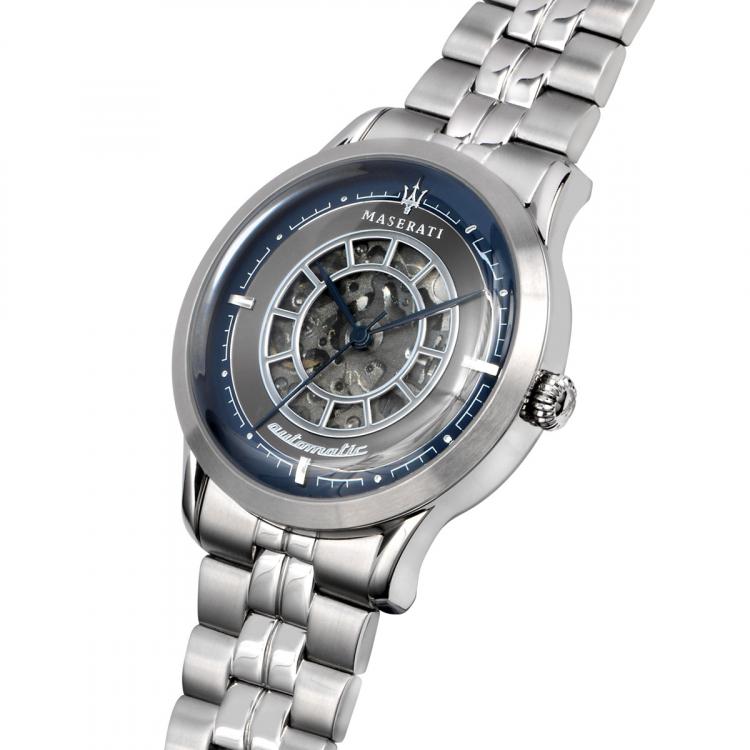 Maserati Ricordo watch angled view showing skeleton dial and steel three-link bracelet