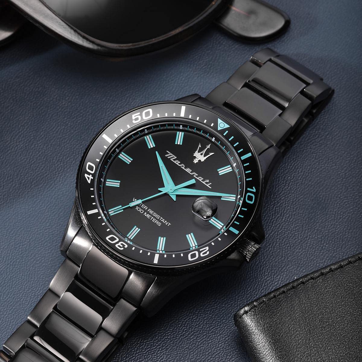 Maserati Sfida watch worn on wrist showing black dial and bracelet
