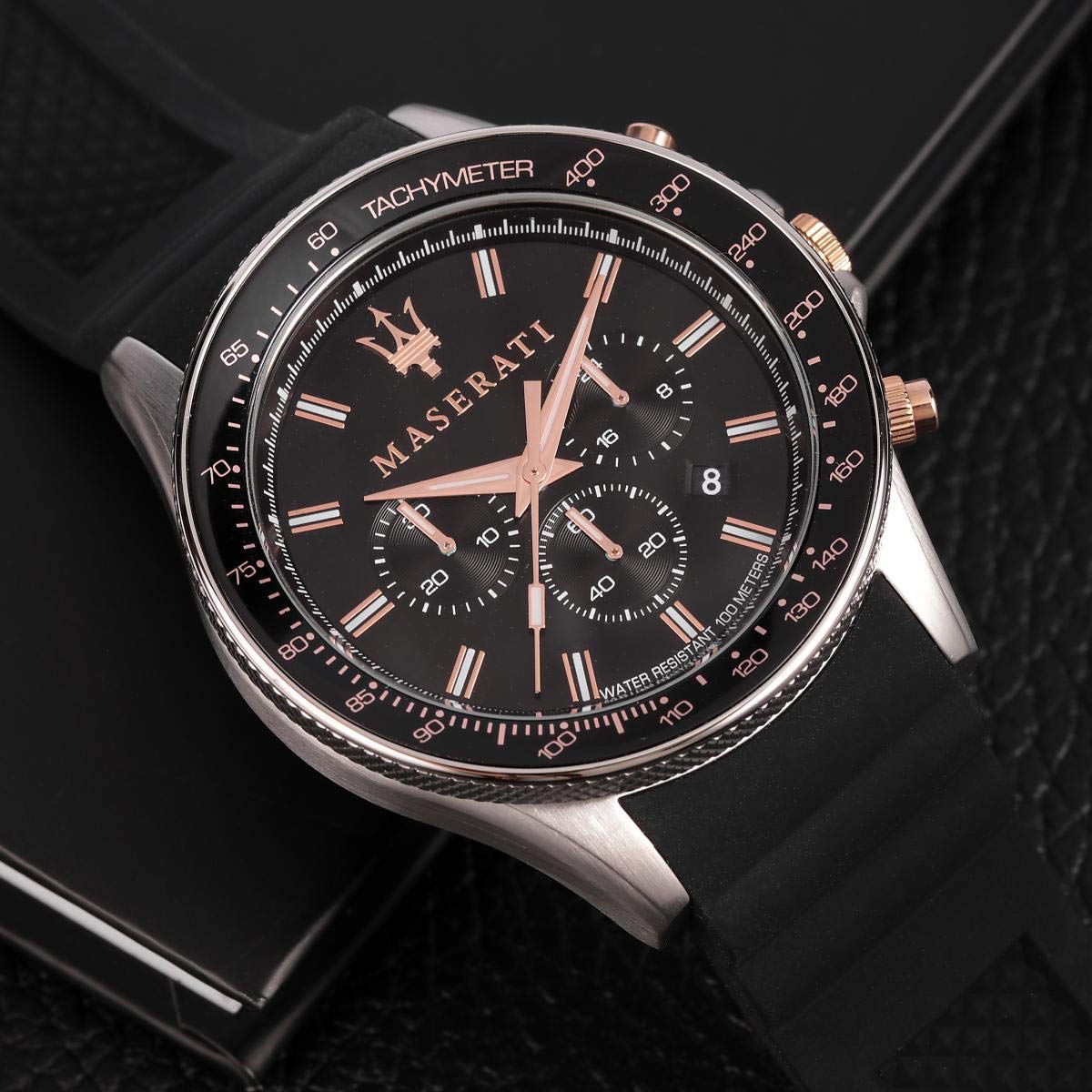 Close-up detail of Maserati Sfida dial showing chronograph subdials and rose gold markers