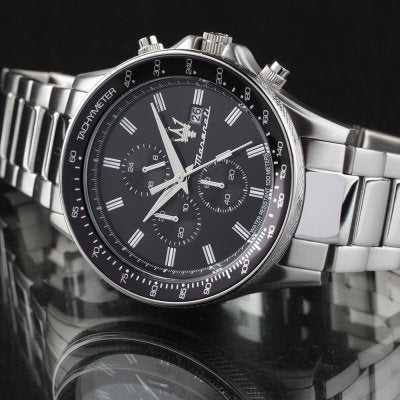 Maserati Sfida chronograph angled view showing black dial with Roman numerals and silver steel bracelet