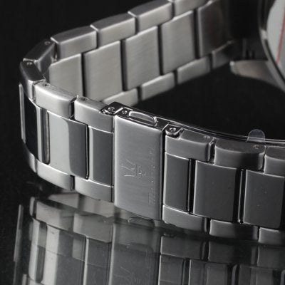 Close-up of Maserati Sfida silver stainless steel three-link bracelet with deployment clasp