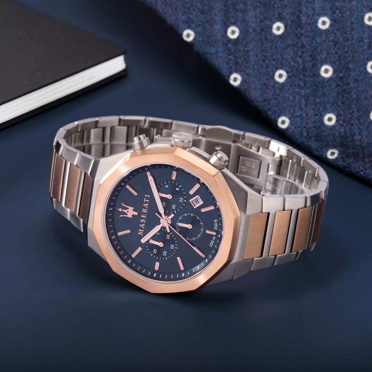 Maserati Stile chronograph watch on wrist, showing blue dial and two-tone design