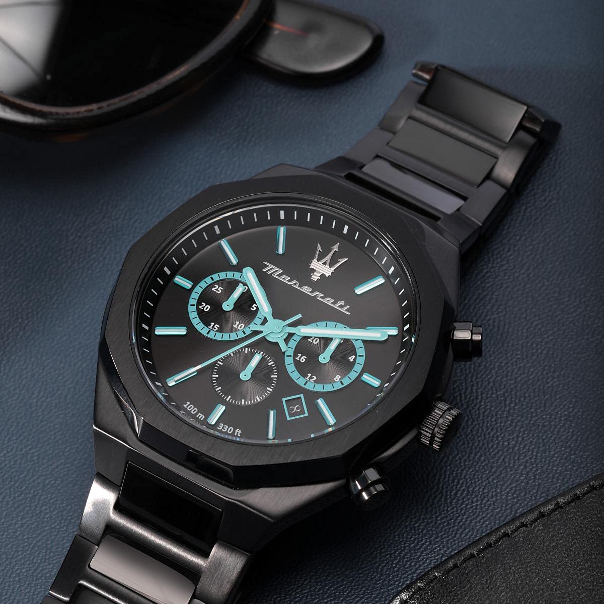 Dial detail of Maserati Stile showing turquoise chronograph subdials and date window