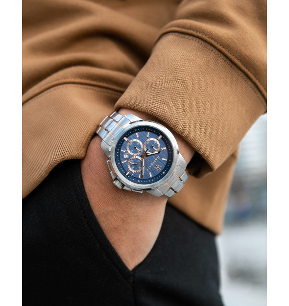 Maserati Successo chronograph watch worn on wrist with blue dial and rose gold accents