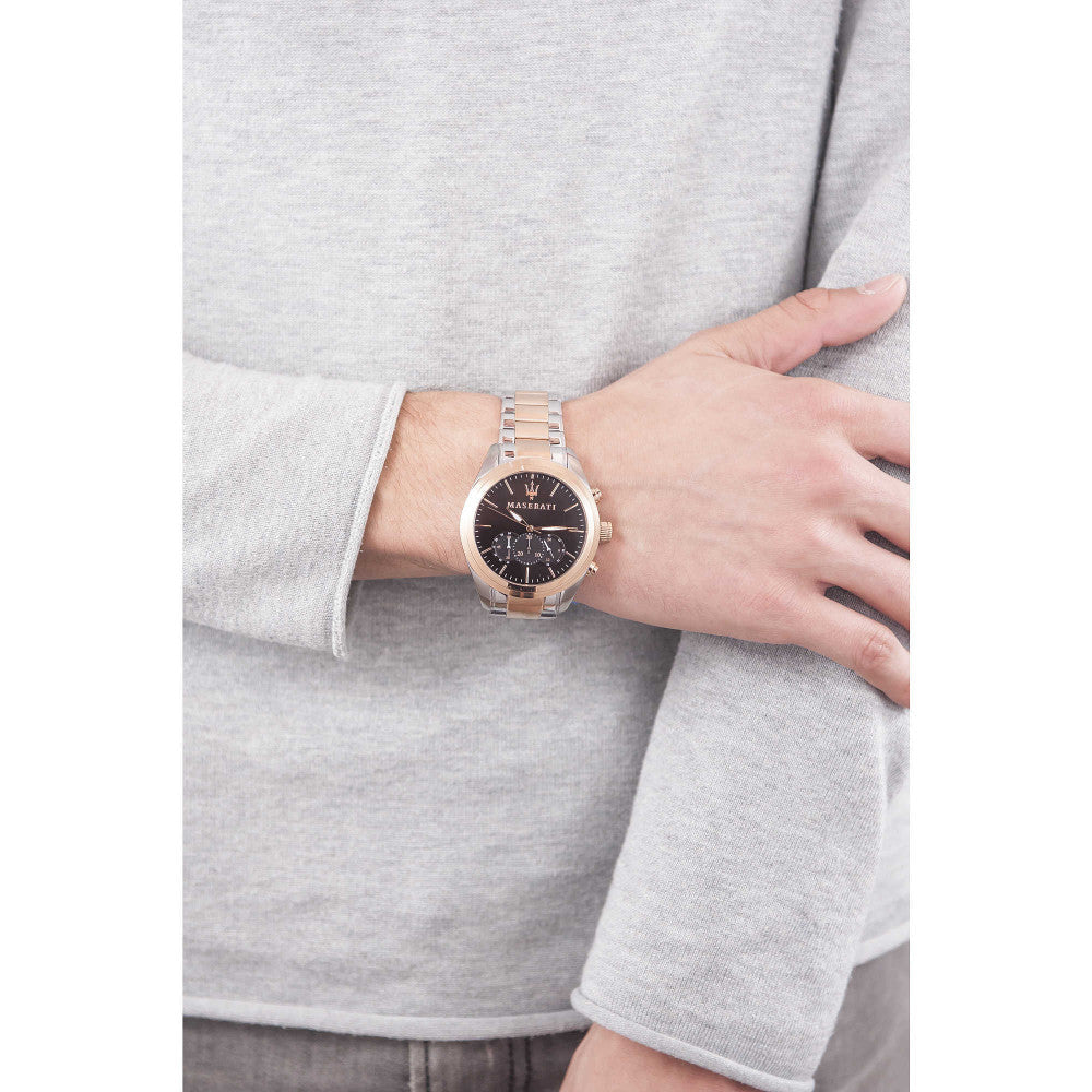 Maserati Traguardo chronograph watch worn on wrist, showing brown dial and two-tone design