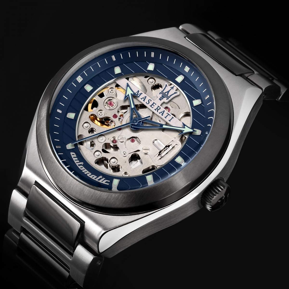 Close-up detail of Maserati Triconic blue skeleton dial with visible automatic movement