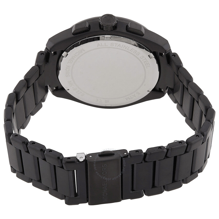 Michael Kors Accelerator 2.0 watch caseback showing stainless steel case back and black bracelet