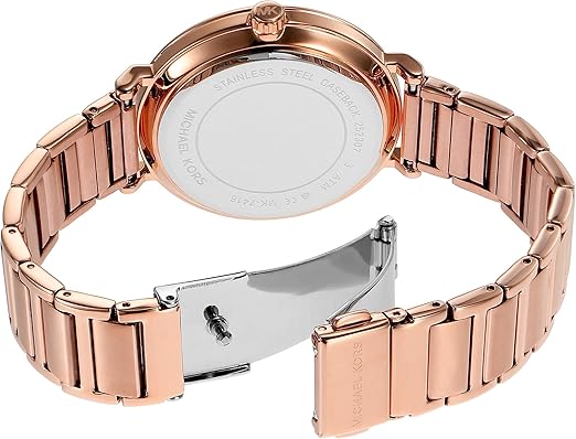 Michael Kors Addyson MK7416 caseback showing engraved stainless steel with rose gold bracelet