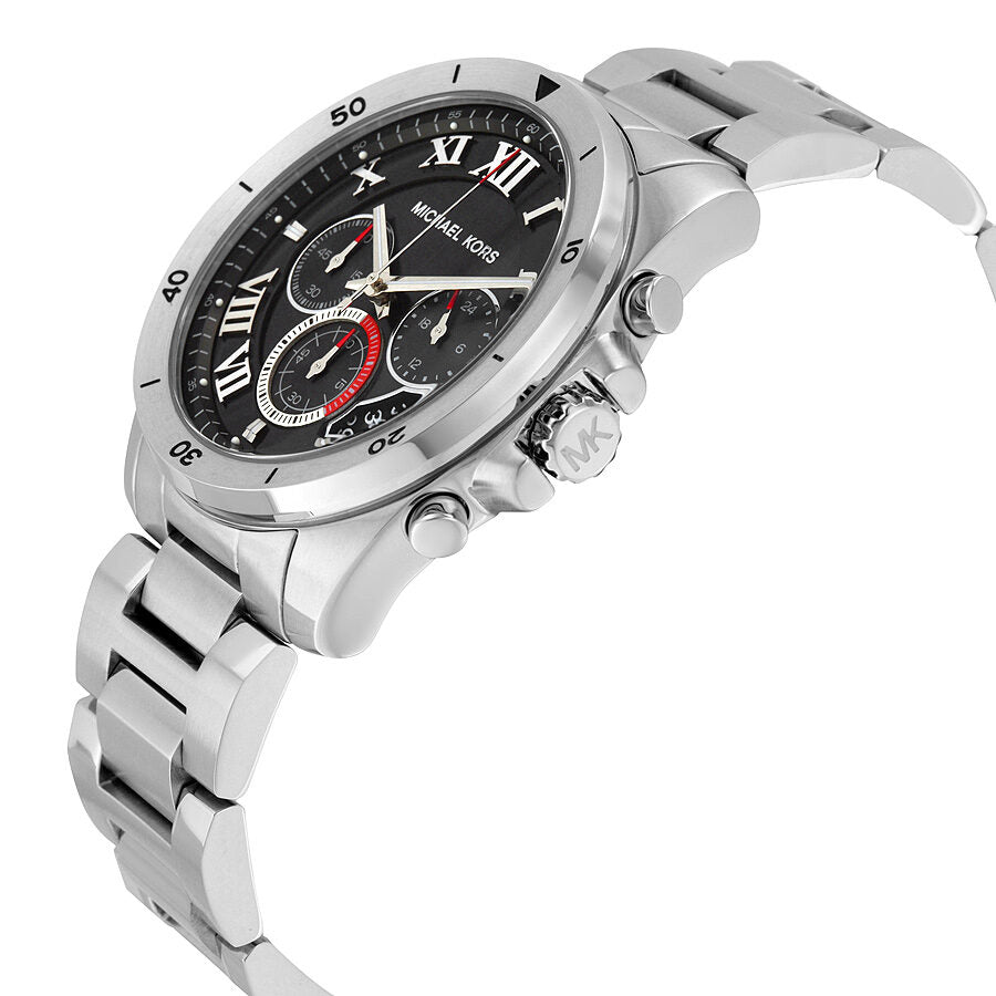 Michael Kors Brecken chronograph watch at angle showing case profile and stainless steel bracelet detail