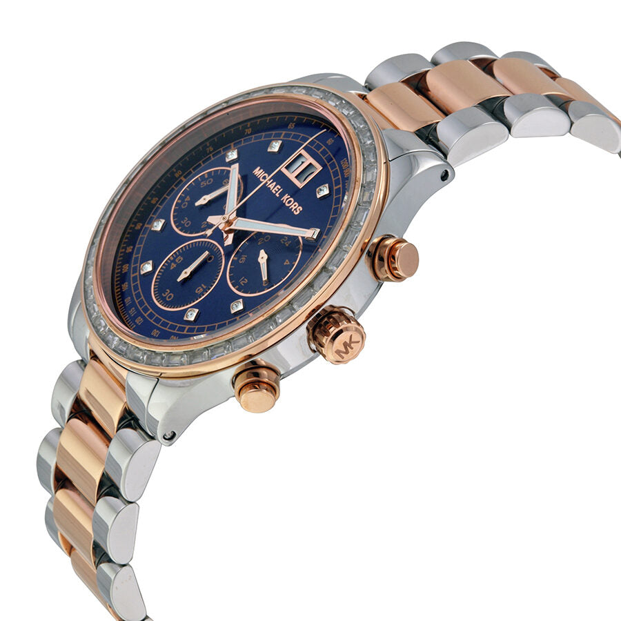 Michael Kors Brinkley watch angled view showing navy dial and two-tone bracelet detail