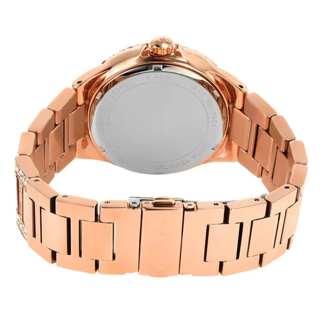 Michael Kors Camille watch caseback showing rose gold steel band and closure