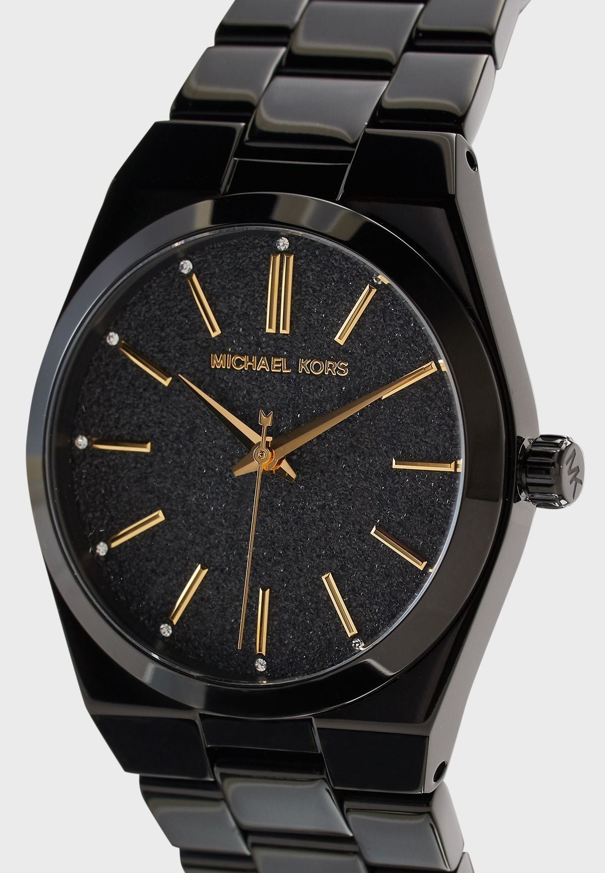 Michael Kors Channing all-black watch shown at angle with black stainless steel bracelet and gold accents