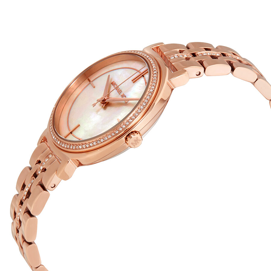 Michael Kors Cinthia watch shown at angle with rose gold tone bracelet and crystal bezel