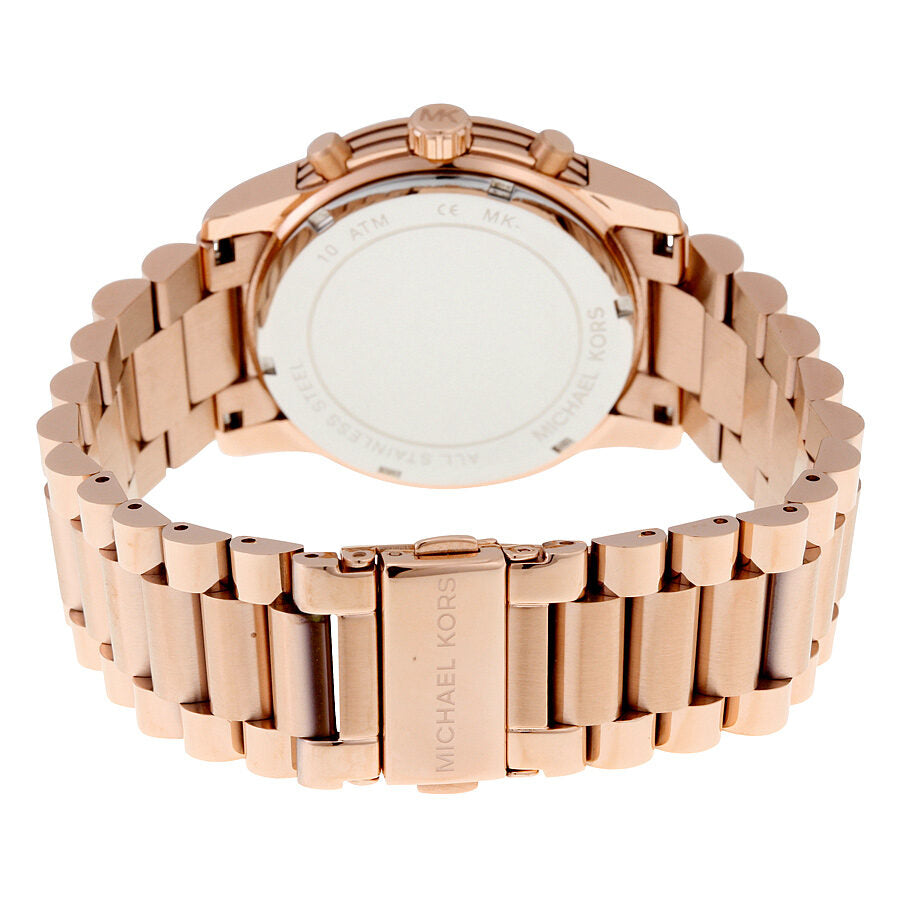Michael Kors Cooper watch caseback showing rose gold-tone bracelet and Michael Kors branding