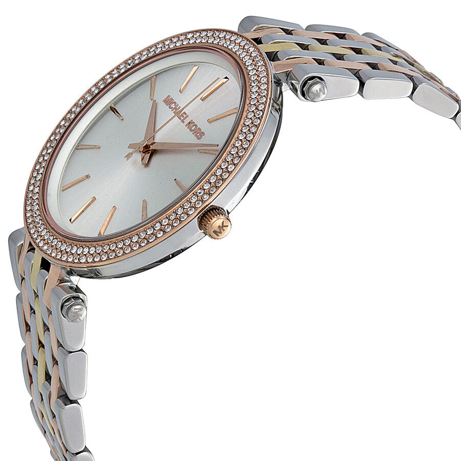 Michael Kors Darci ladies watch showing angled side profile of crystal bezel and mixed metal bracelet