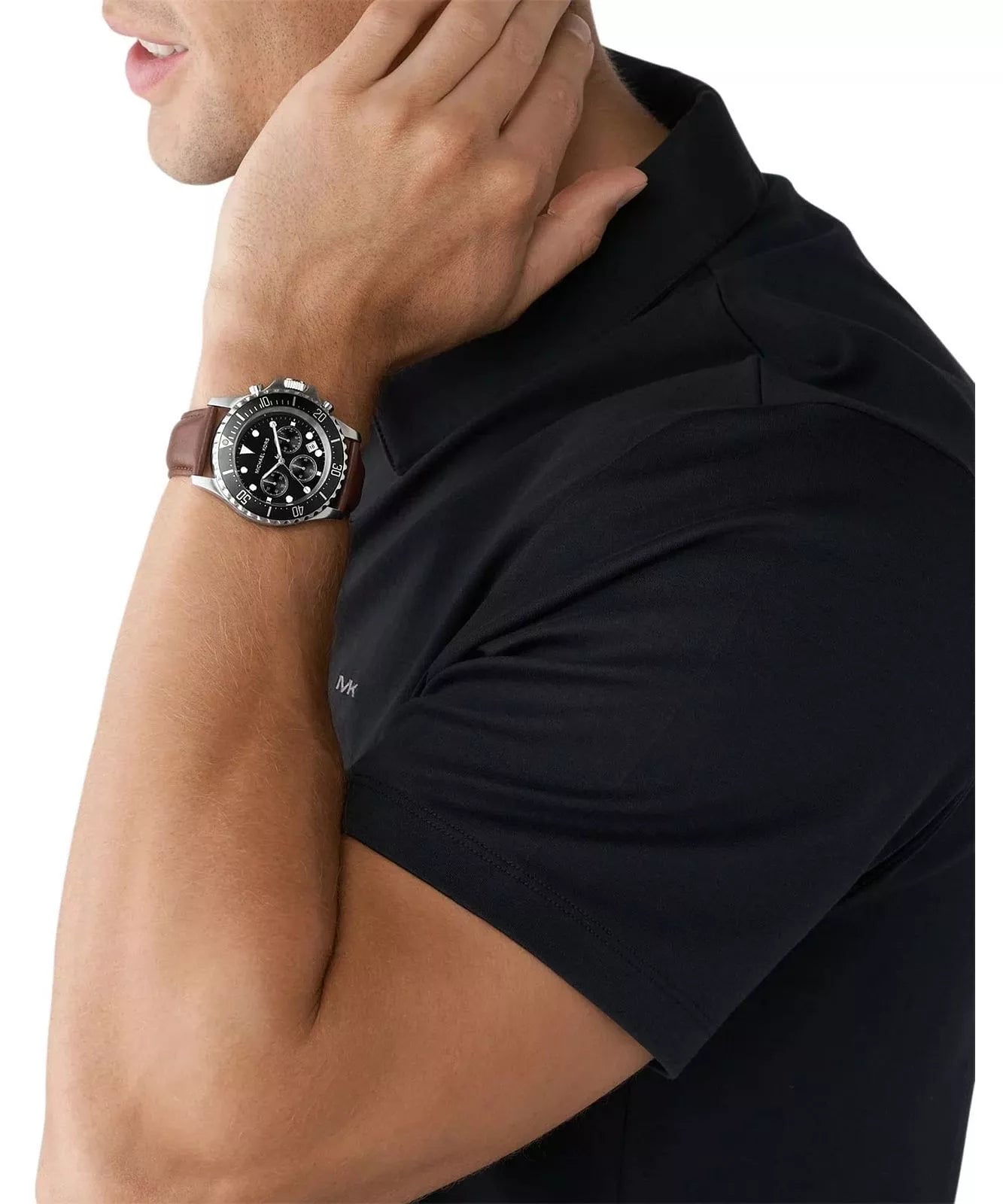 Michael Kors Everest chronograph watch worn on wrist with brown leather strap