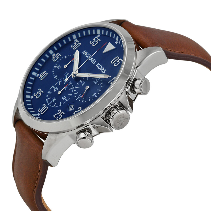 Side angle view of Michael Kors Gage Chronograph watch showing dial, case, and brown strap