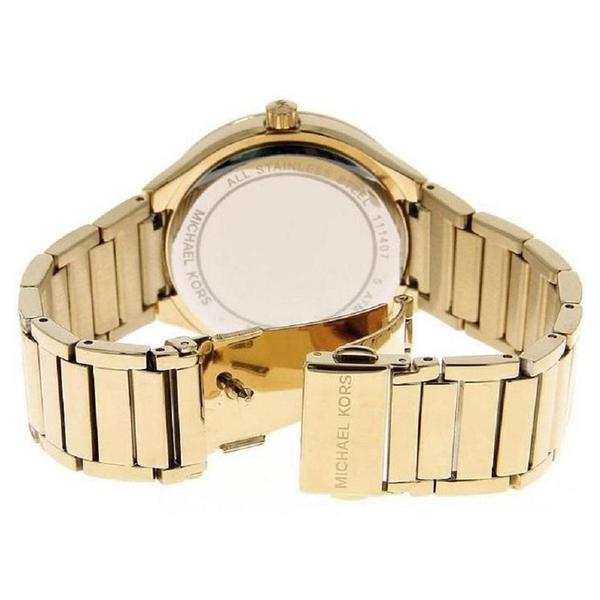 Michael Kors Kerry watch caseback showing gold-tone stainless steel and model details