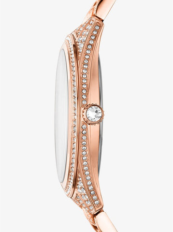 Side view of Michael Kors Lauryn rose gold women's watch showing crystal-embellished case profile