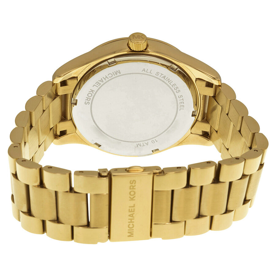 Michael Kors Layton watch caseback showing gold-tone stainless steel case with engraved details