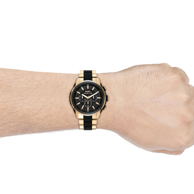 Michael Kors Lennox chronograph watch worn on wrist with two-tone bracelet