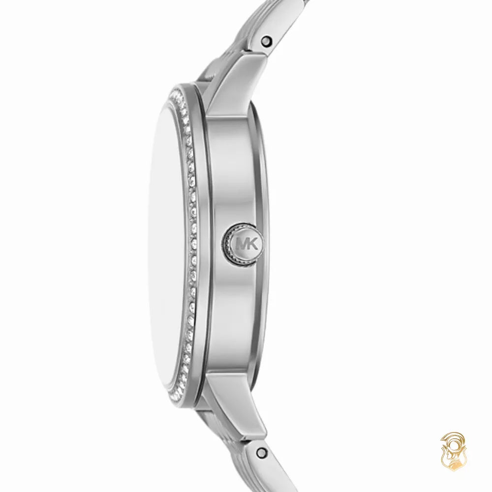 Side view of Michael Kors Melissa silver-tone watch showing crystal bezel and profile depth