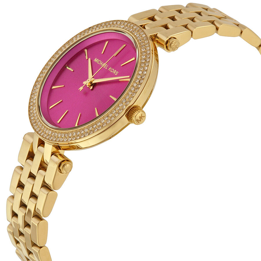 Michael Kors Mini Darci watch side angle view showing fuchsia dial and gold-tone strap
