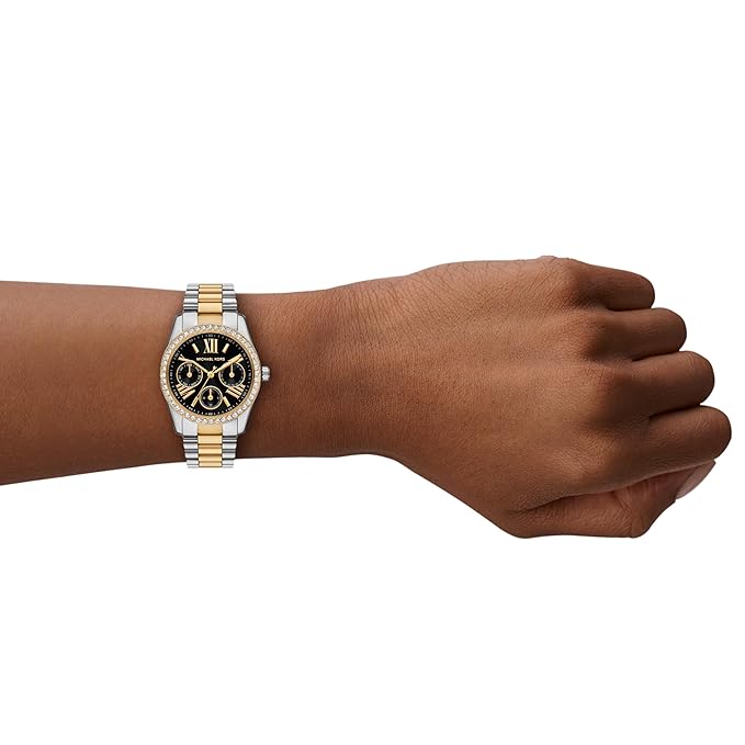 Michael Kors Mini Darci watch worn on wrist, two-tone bracelet visible