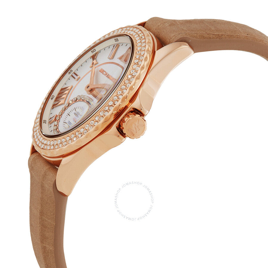 Side angled view of Michael Kors Mini Everest watch showing rose gold case, crystal bezel, and tan leather strap