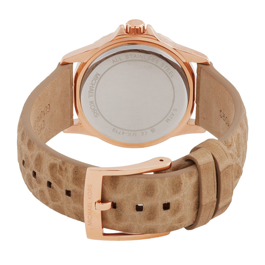Caseback view of Michael Kors Mini Everest watch with rose gold case and tan quilted leather strap