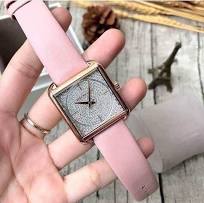 Michael Kors Lake Pavé watch on wrist displaying rose gold case and pave crystal dial