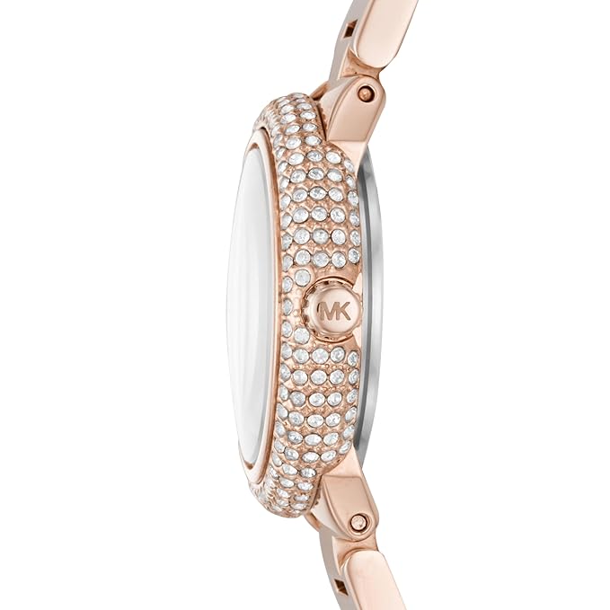 Side profile of MK3858 showing crystal-covered bezel and rose gold-tone case with MK logo